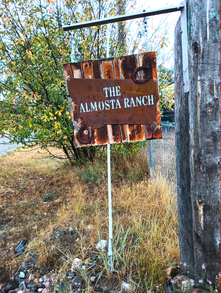 The Almosta Ranch sign at this Montana ranch vacation rental near Bozeman
