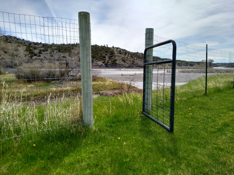 Back gate opening to the river and pasture at Yellowstone River Retreat, Montana