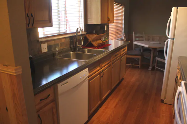 Kitchen with dishwasher at the Madison Guest House vacation rental in Bozeman