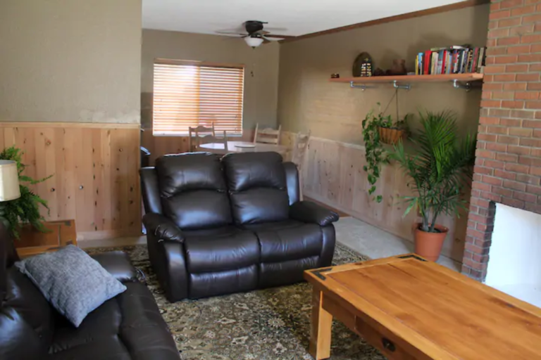 Living room with leather recliners at the Madison Guest House in Bozeman, Montana